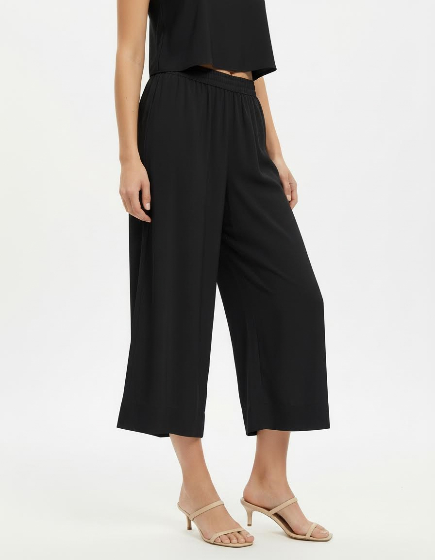 Pantalone ampio in tessuto fluido con vita elasticata