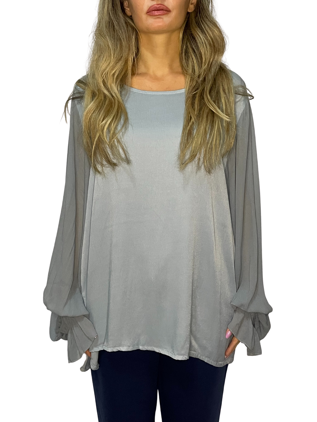 Blusa con maniche ampie, polsino arricciato e goccia sul retro