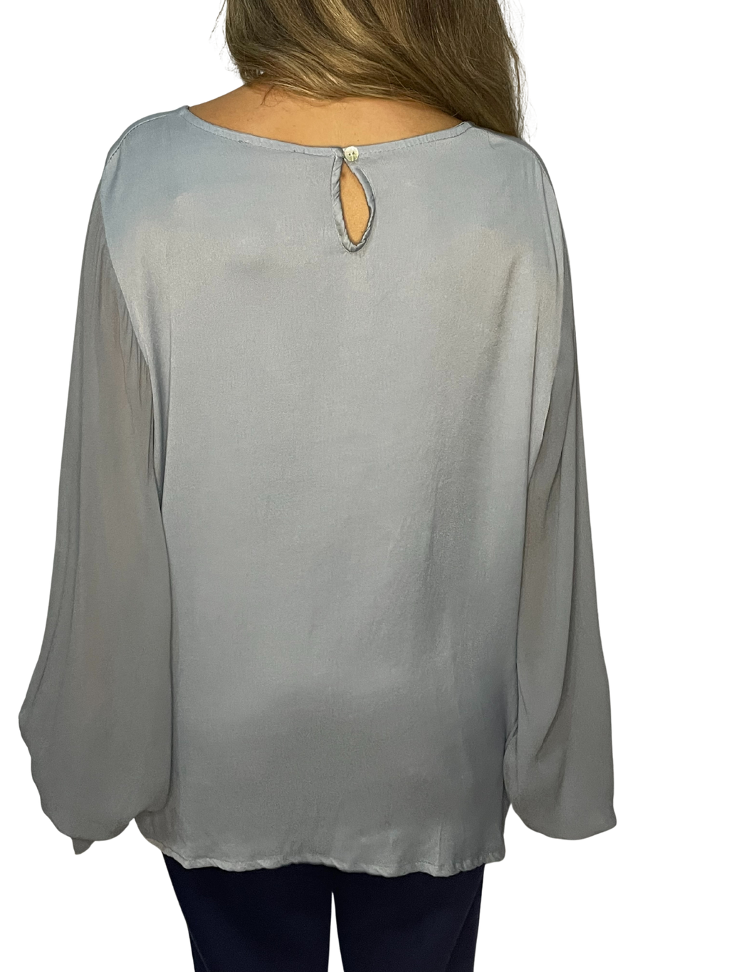 Blusa con maniche ampie, polsino arricciato e goccia sul retro