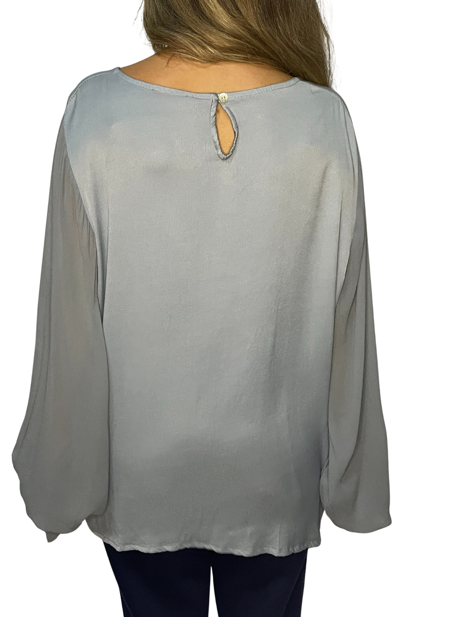 Blusa con maniche ampie, polsino arricciato e goccia sul retro