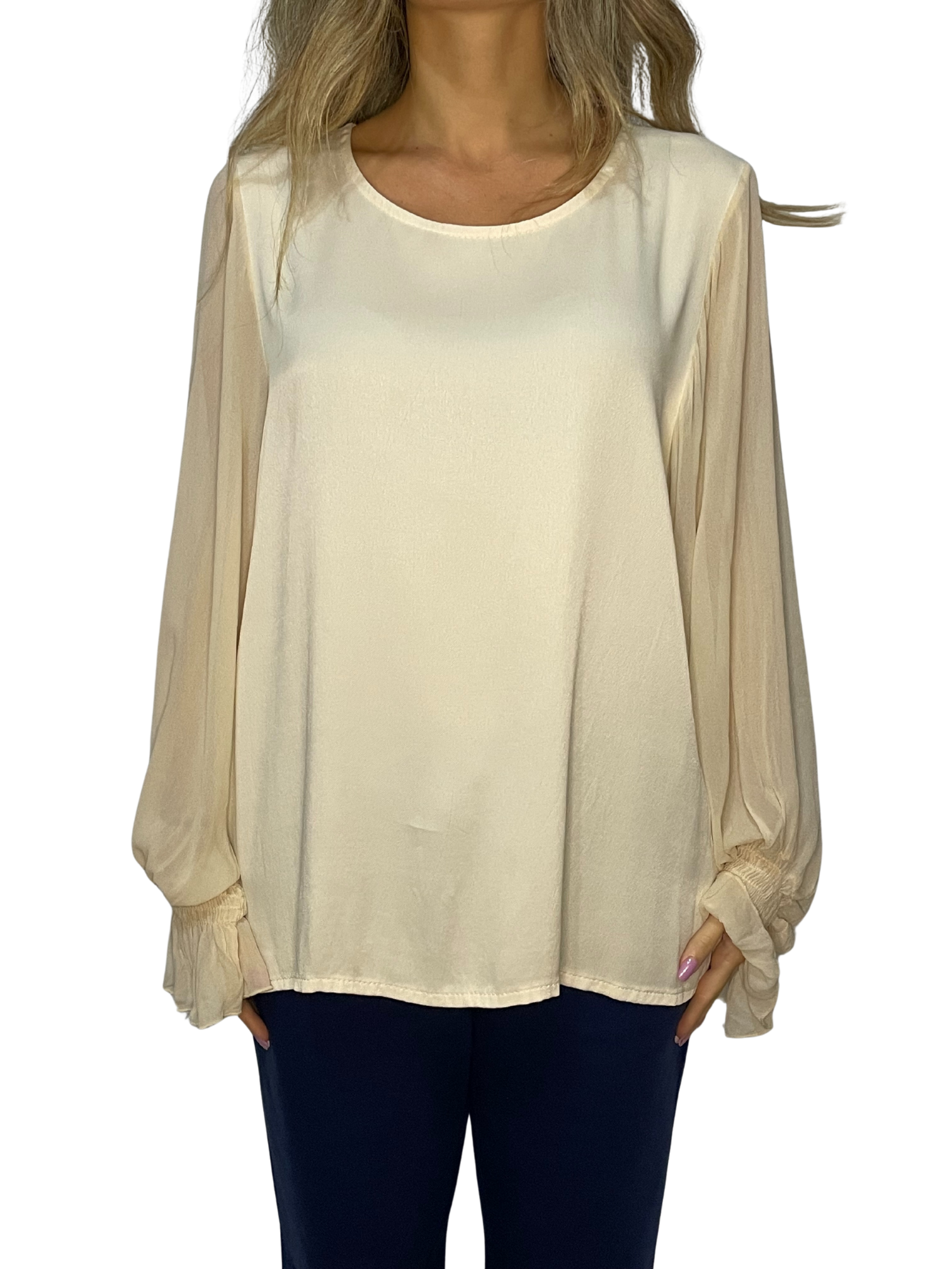 Blusa con maniche ampie, polsino arricciato e goccia sul retro