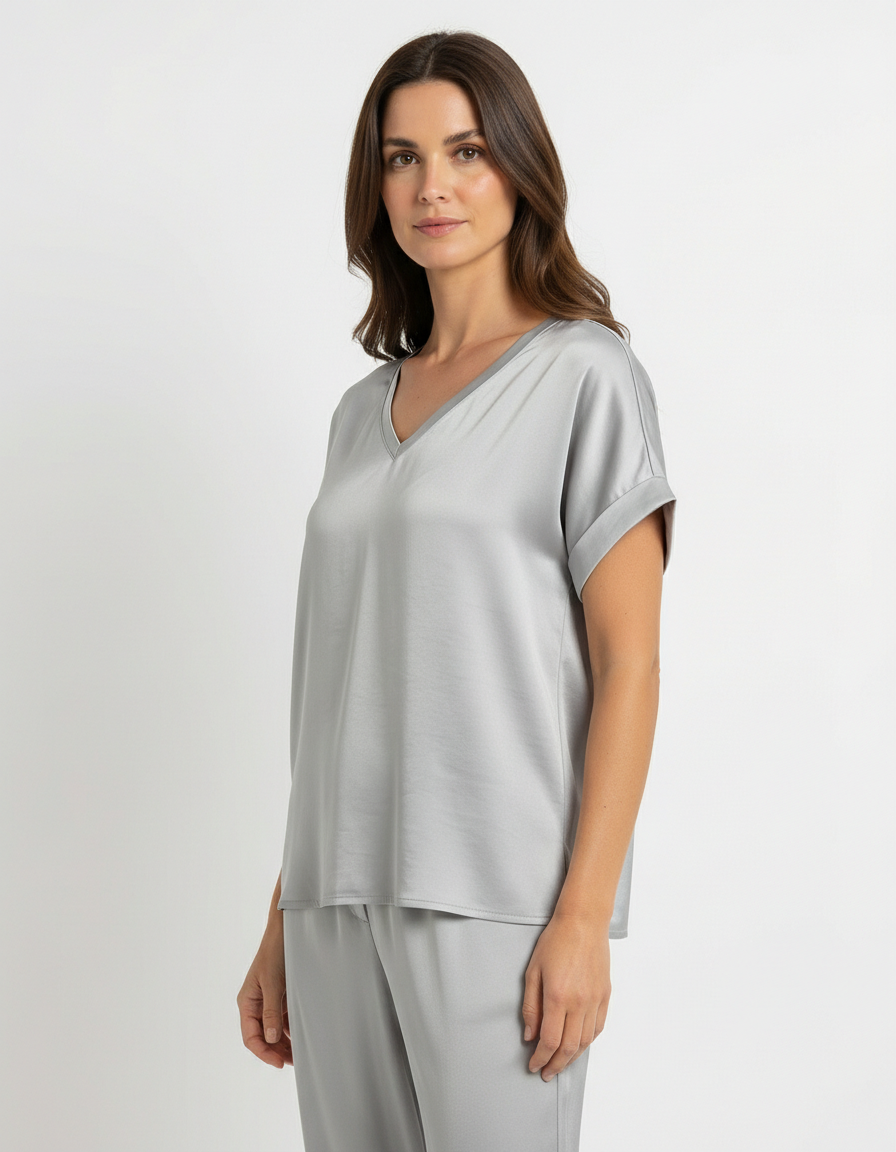 Maglia fluida mix satin-jersey con scollo a V e fondo asimmetrico