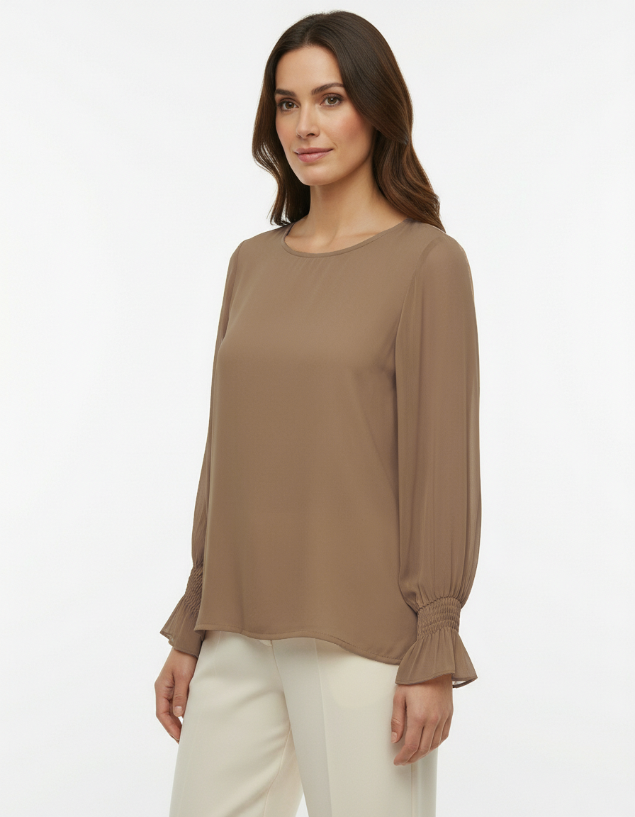 Blusa con maniche ampie, polsino arricciato e goccia sul retro