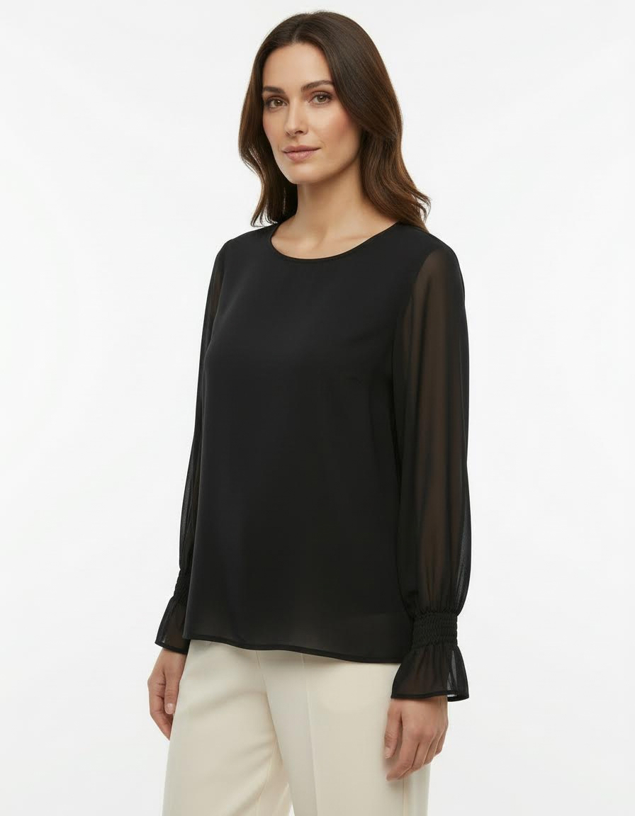 Blusa con maniche ampie, polsino arricciato e goccia sul retro