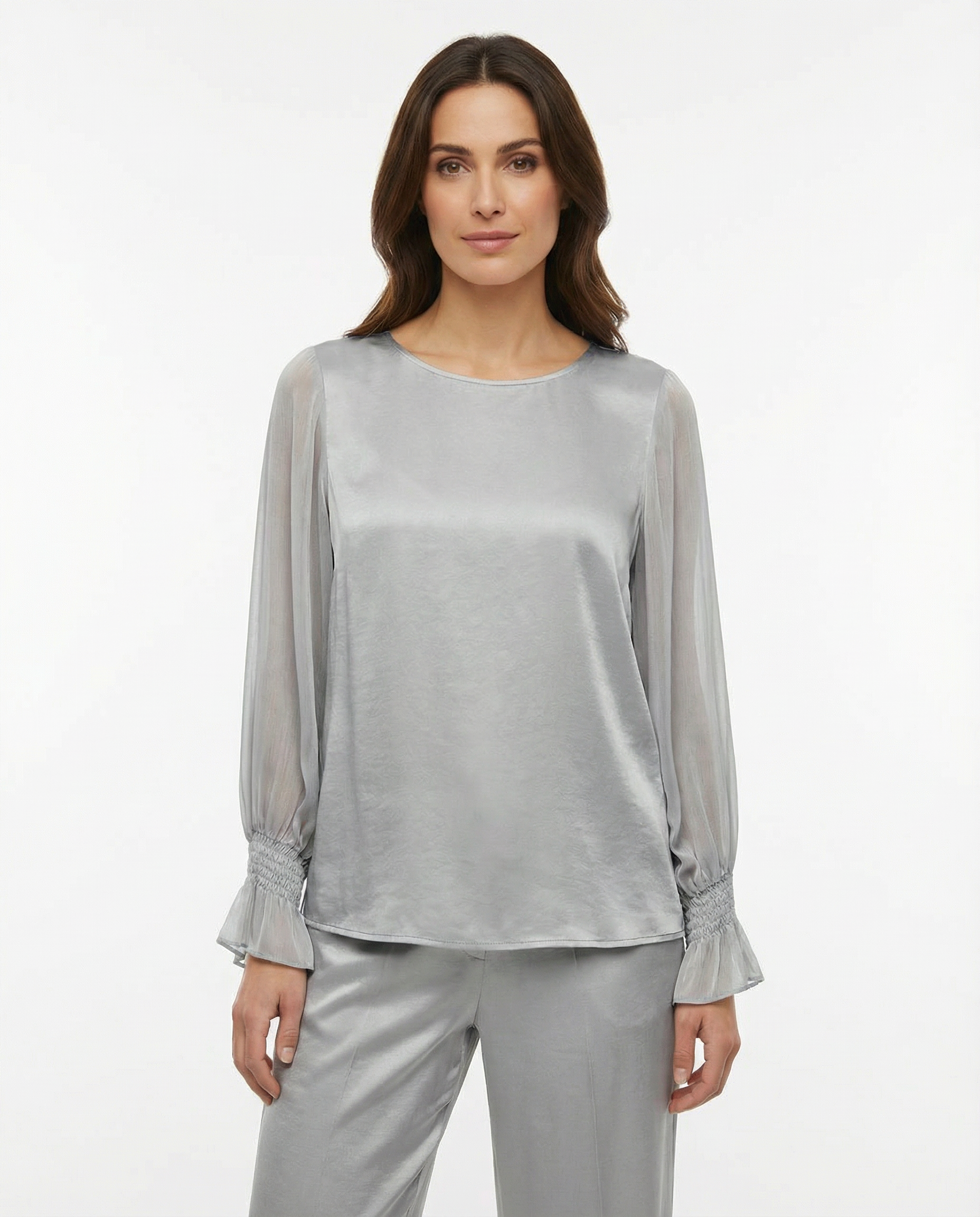 Blusa con maniche ampie, polsino arricciato e goccia sul retro