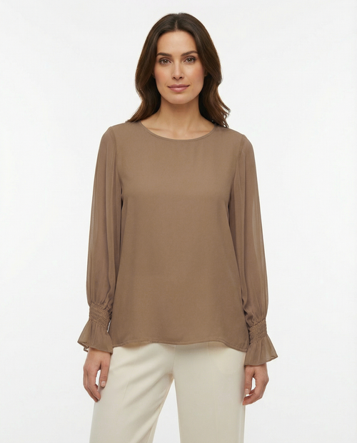 Blusa con maniche ampie, polsino arricciato e goccia sul retro